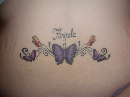 Lower Back Tattoo Of Girl